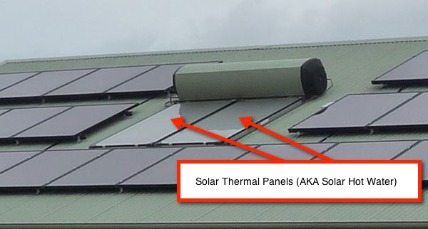 Solar Hot Water Panels surrounded by PV panels 太阳热板